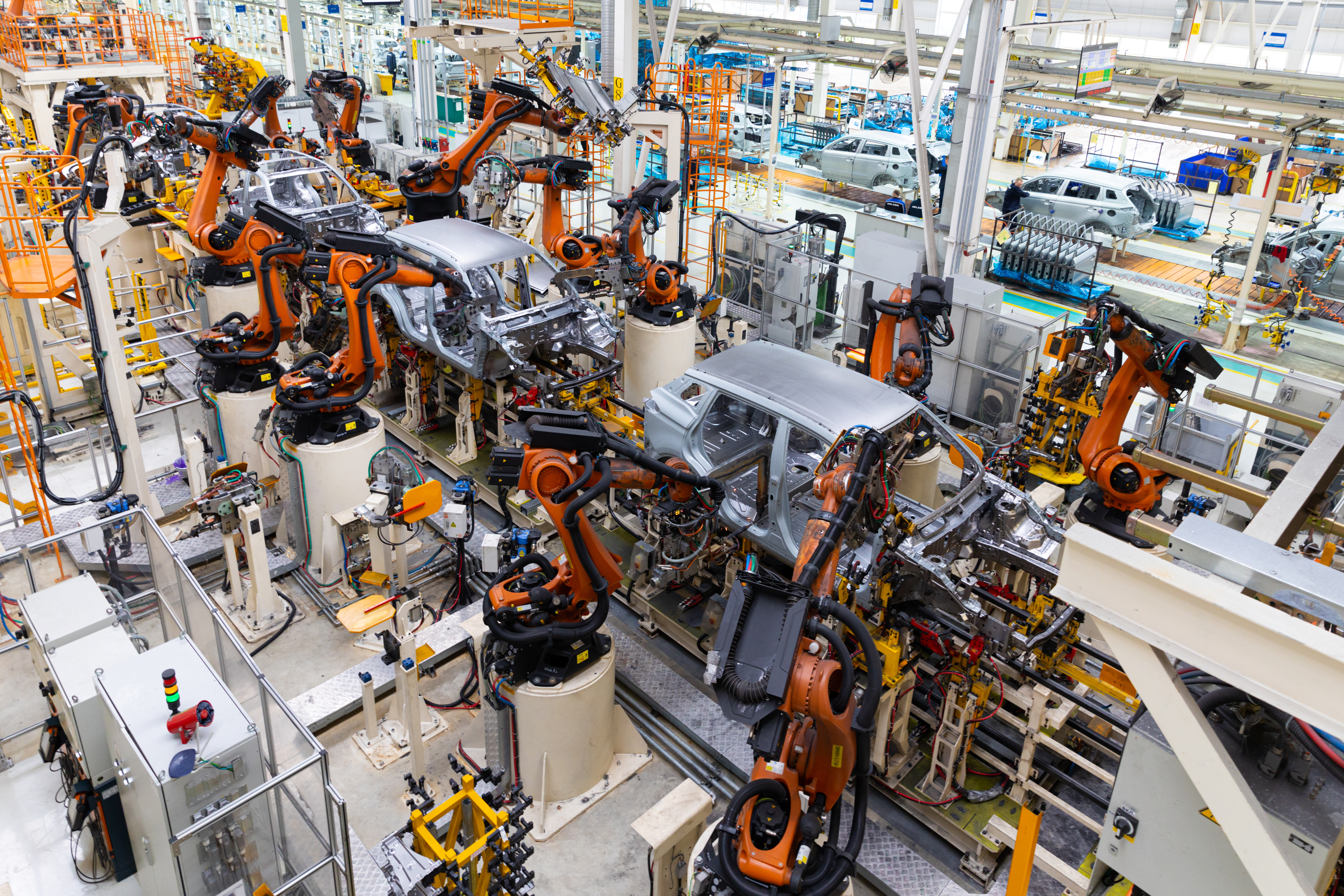 car-bodies-are-assembly-line-factory-production-cars-modern-automotive-industry-electric-car-factory-conveyor